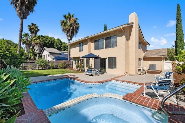 28611 Avenida Del Caballo, Laguna Niguel, CA 92677 - view of pool featuring a patio, a fenced backyard, and a pool with connected hot tub