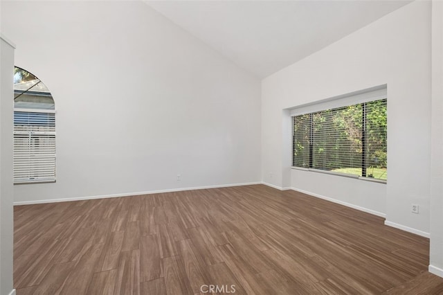 28611 Avenida Del Caballo, Laguna Niguel, CA 92677 - empty room featuring wood finished floors and high vaulted ceiling
