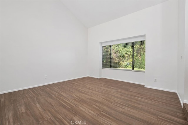 28611 Avenida Del Caballo, Laguna Niguel, CA 92677 - spare room featuring dark wood-type flooring and high vaulted ceiling