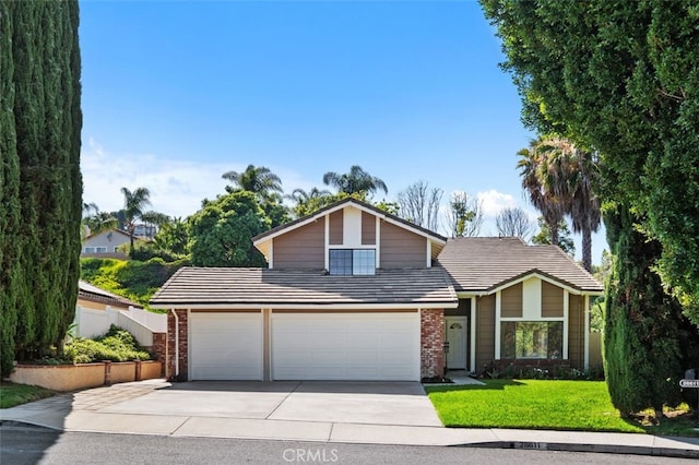 28611 Avenida Del Caballo, Laguna Niguel, CA 92677 - traditional home featuring driveway, brick siding, a tile roof, and a garage