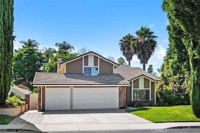28611 Avenida Del Caballo, Laguna Niguel, CA 92677 - view of front of house featuring driveway, brick siding, and an attached garage