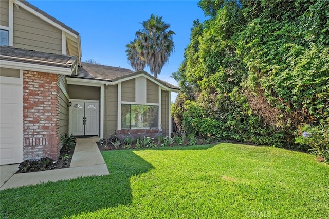 28611 Avenida Del Caballo, Laguna Niguel, CA 92677 - entrance to property with brick siding, a yard, and a garage