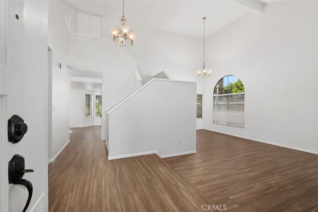 28611 Avenida Del Caballo, Laguna Niguel, CA 92677 - entryway featuring a chandelier, high vaulted ceiling, wood finished floors, beam ceiling, and stairway