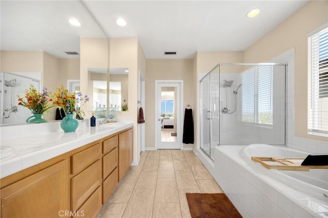 3667 Skylark Way, Brea, CA 92823 - bathroom with a garden tub, a shower stall, double vanity, healthy amount of natural light, and recessed lighting