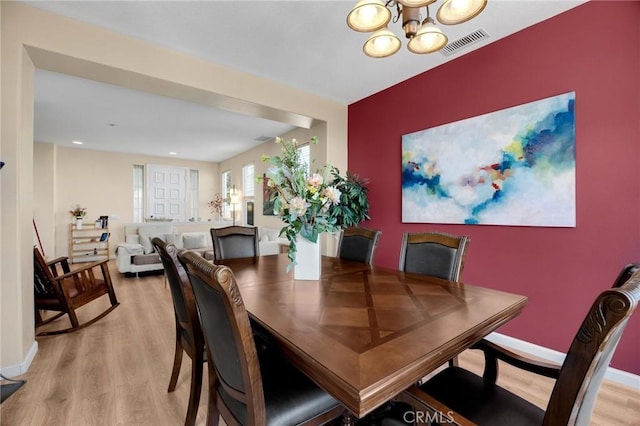 3667 Skylark Way, Brea, CA 92823 - dining area with light wood-type flooring and a chandelier