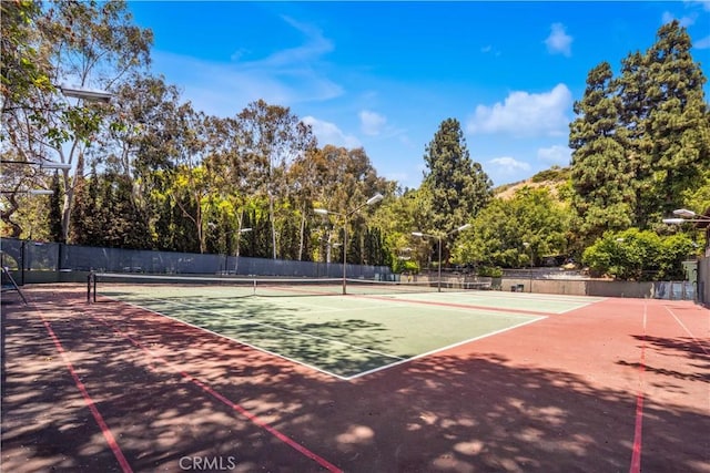 2700 Cahuenga Blvd E Unit 1302, Los Angeles, CA 90068 - view of tennis court featuring view of scattered trees