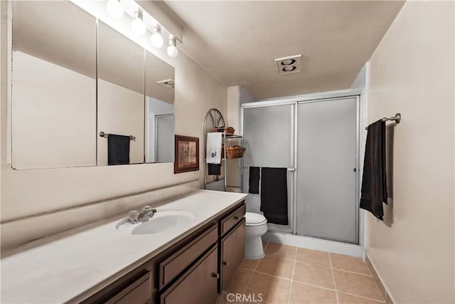 2700 Cahuenga Blvd E Unit 1302, Los Angeles, CA 90068 - bathroom with vanity, a stall shower, and tile patterned floors