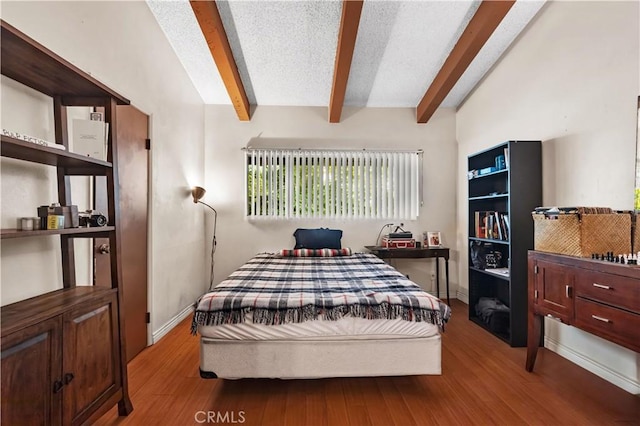 2700 Cahuenga Blvd E Unit 1302, Los Angeles, CA 90068 - bedroom with beam ceiling and wood finished floors