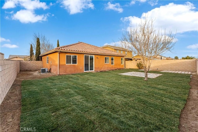 3150 James Ct, Lancaster, CA 93535 - back of house featuring a tile roof, stucco siding, a fenced backyard, and a patio area