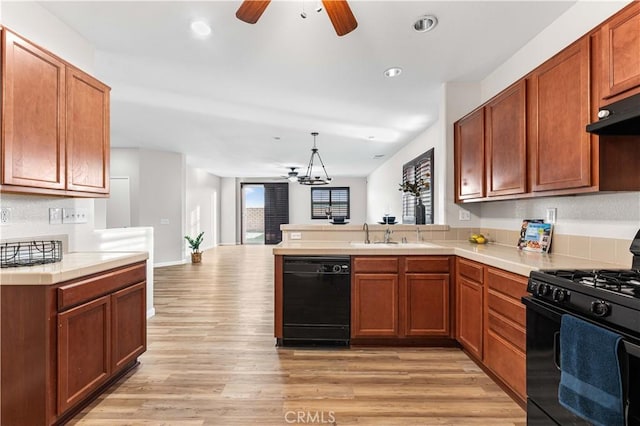 3150 James Ct, Lancaster, CA 93535 - kitchen with black appliances, ceiling fan, a peninsula, light wood-style flooring, and recessed lighting