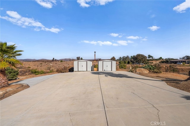 38225 Camino Sierra Rd, Temecula, CA 92592 - view of front of property with a storage shed and concrete driveway