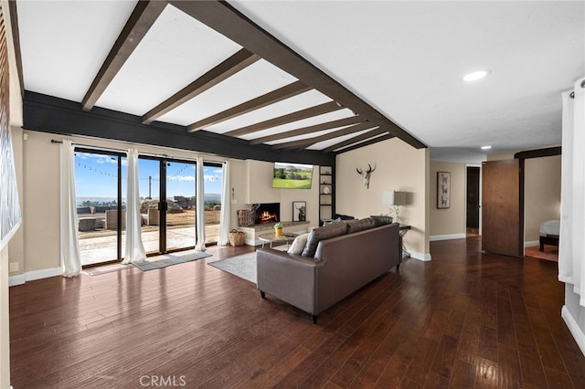 38225 Camino Sierra Rd, Temecula, CA 92592 - living area featuring beam ceiling, a warm lit fireplace, recessed lighting, and wood finished floors