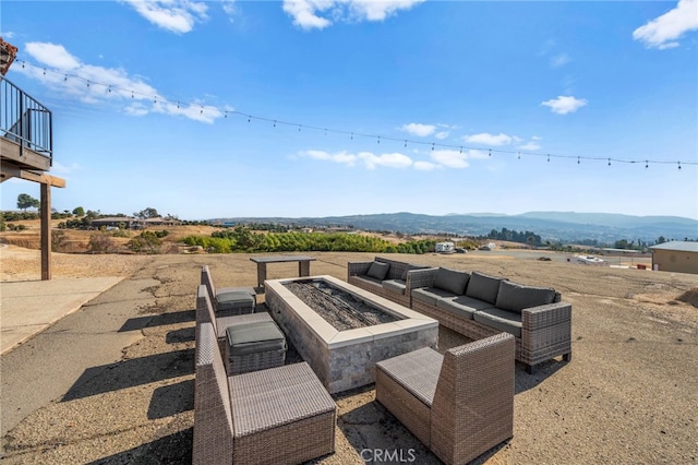 38225 Camino Sierra Rd, Temecula, CA 92592 - view of patio / terrace featuring an outdoor living space with a fire pit and a mountain view