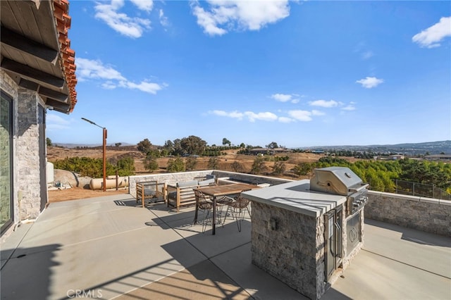 38225 Camino Sierra Rd, Temecula, CA 92592 - view of patio / terrace featuring an outdoor kitchen