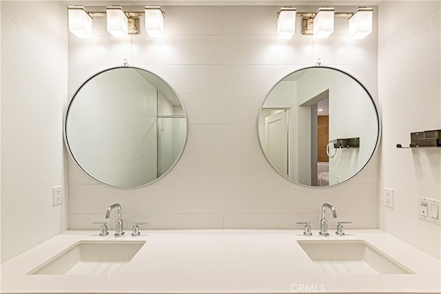 275 Pin Ln, Covina, CA 91722 - bathroom with double vanity and tasteful backsplash