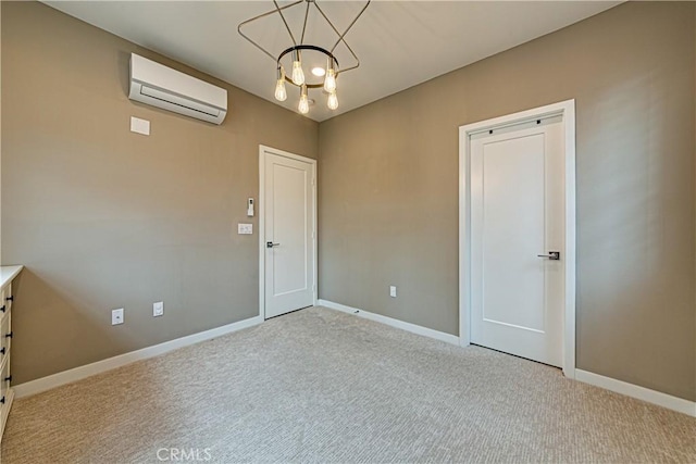 275 Pin Ln, Covina, CA 91722 - spare room with a wall mounted air conditioner, carpet flooring, and a chandelier