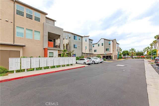 275 Pin Ln, Covina, CA 91722 - view of asphalt street featuring sidewalks, a residential view, and curbs