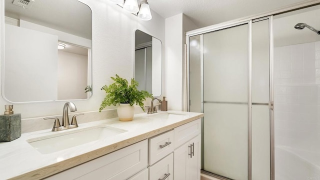 415 Stoney Point Way Unit 106, Oceanside, CA 92058 - full bath with a shower with door and double vanity