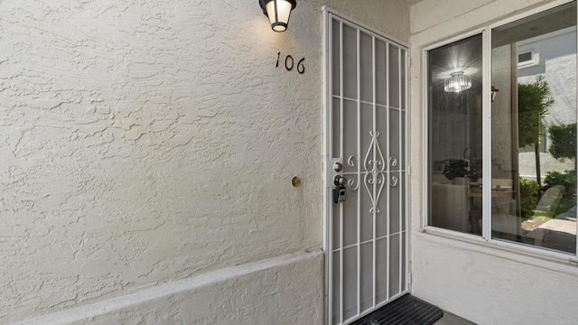 415 Stoney Point Way Unit 106, Oceanside, CA 92058 - doorway to property featuring stucco siding