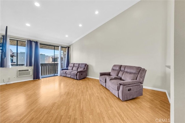 4170 Elm Ave Unit 304, Long Beach, CA 90807 - sitting room with a wall mounted air conditioner, light wood-style floors, ornamental molding, and recessed lighting