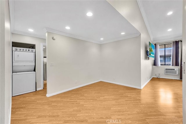 4170 Elm Ave Unit 304, Long Beach, CA 90807 - spare room featuring estacked washer and dryer, ornamental molding, light wood finished floors, recessed lighting, and a wall mounted AC