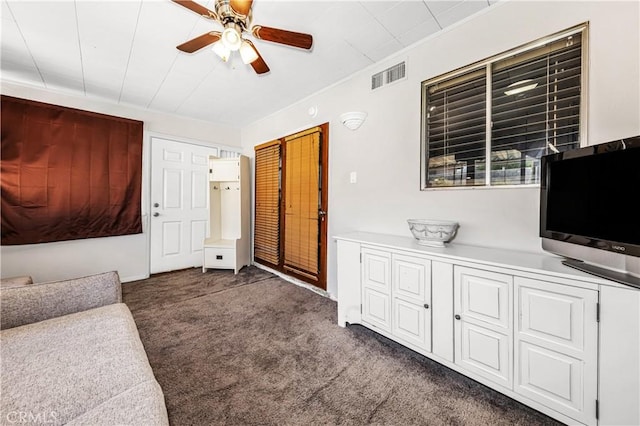 66890 Hacienda Ave, Desert Hot Springs, CA 92240 - living area with ceiling fan and carpet flooring