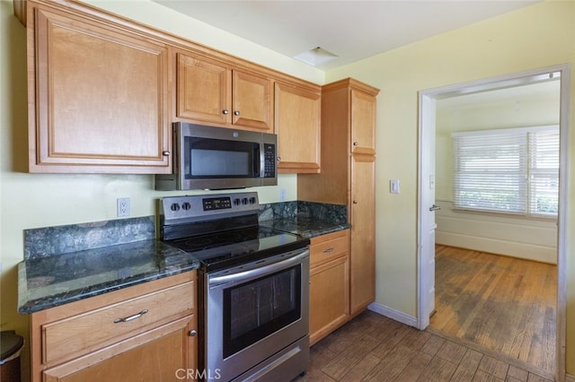 2046 E Glenoaks Blvd, Glendale, CA 91206 - kitchen featuring stainless steel appliances, dark wood finished floors, and dark stone counters