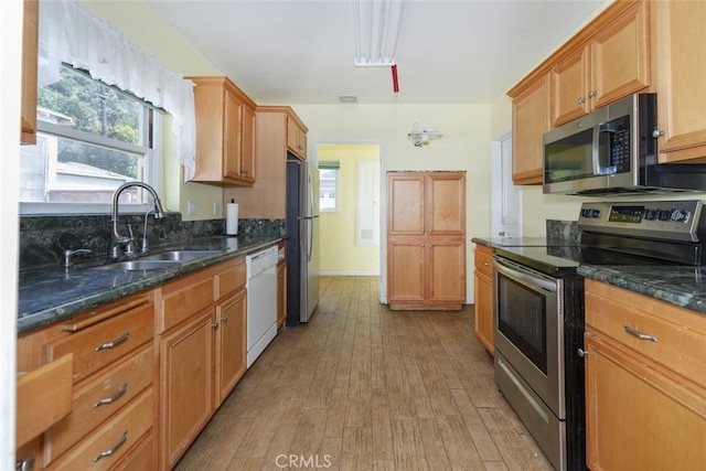 2046 E Glenoaks Blvd, Glendale, CA 91206 - kitchen with stainless steel appliances, light wood-style floors, and dark stone counters