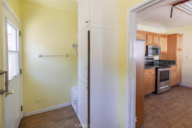 2046 E Glenoaks Blvd, Glendale, CA 91206 - kitchen with appliances with stainless steel finishes, wood finished floors, and dark countertops