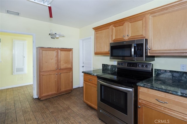 2046 E Glenoaks Blvd, Glendale, CA 91206 - kitchen featuring appliances with stainless steel finishes, dark wood-style floors, and dark stone counters