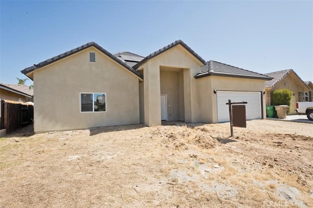 540 Shady Meadow Ct, Bakersfield, CA 93308 - view of front facade featuring a garage, stucco siding, and a tile roof