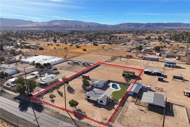 41331 20th St W, Palmdale, CA 93551 - aerial overview of property's location with mountains and property parcel outlined