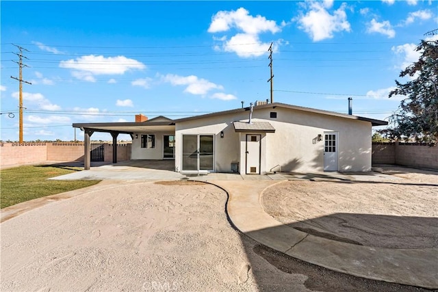 41331 20th St W, Palmdale, CA 93551 - rear view of house featuring stucco siding