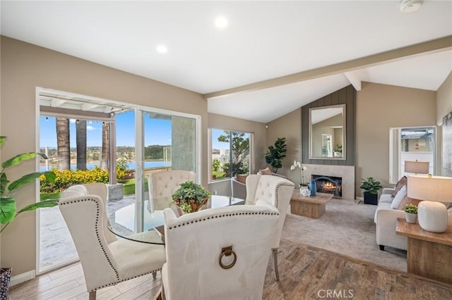 7012 E Viewpoint Ln, Anaheim Hills, CA 92807 - dining space with a water view, a fireplace, wood finished floors, and recessed lighting