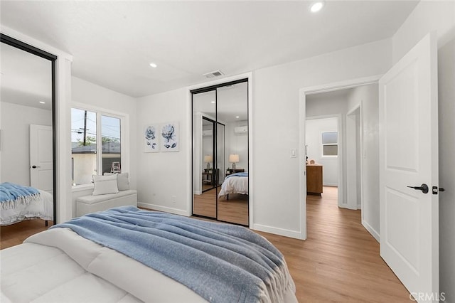 1021 W 5th St, Corona, CA 92882 - bedroom featuring light wood-type flooring, recessed lighting, and a closet