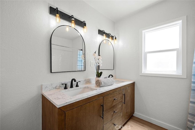 1021 W 5th St, Corona, CA 92882 - bathroom with double vanity and wood finished floors