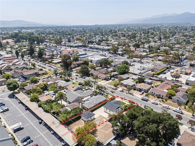 1021 W 5th St, Corona, CA 92882 - aerial perspective of suburban area featuring mountains and property boundaries highlighted