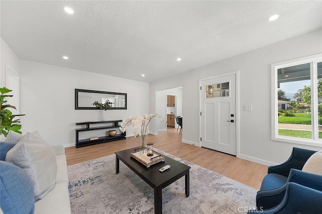 1021 W 5th St, Corona, CA 92882 - living area with light wood-style flooring and recessed lighting