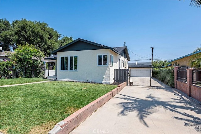 1021 W 5th St, Corona, CA 92882 - view of front facade featuring a gate, stucco siding, and an outbuilding