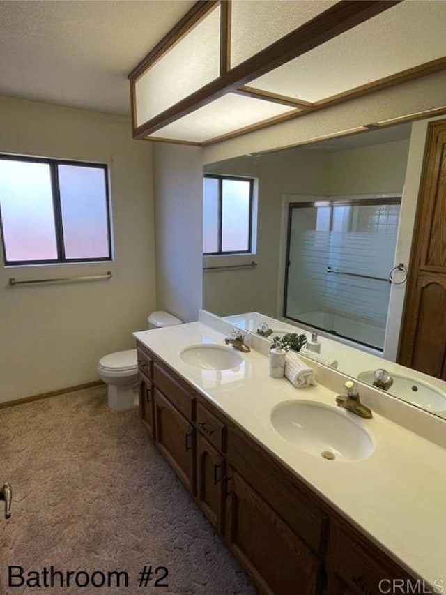 1003 Amherst Ave, Hemet, CA 92544 - bathroom featuring double vanity and a shower