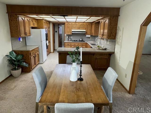 1003 Amherst Ave, Hemet, CA 92544 - dining area with light colored carpet and baseboards
