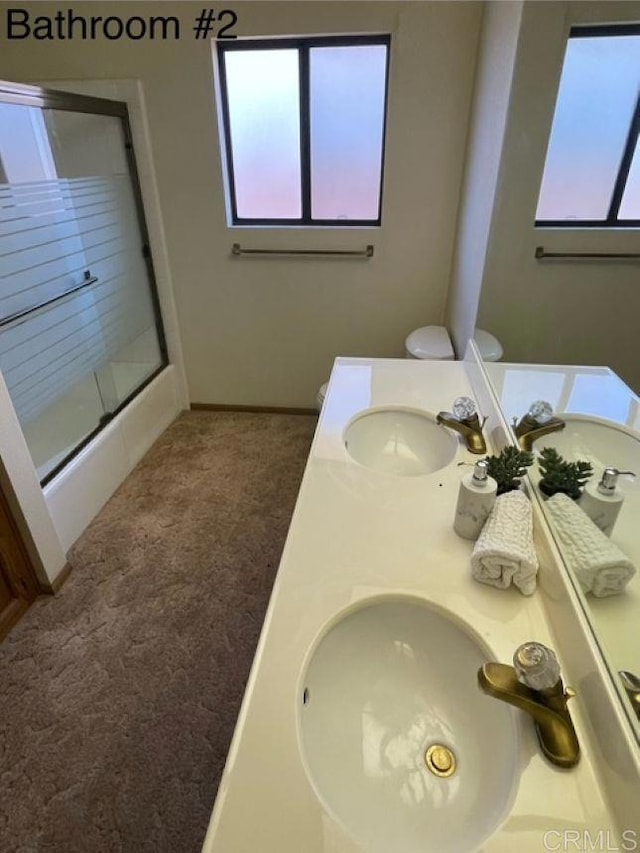 1003 Amherst Ave, Hemet, CA 92544 - bathroom featuring a stall shower and double vanity
