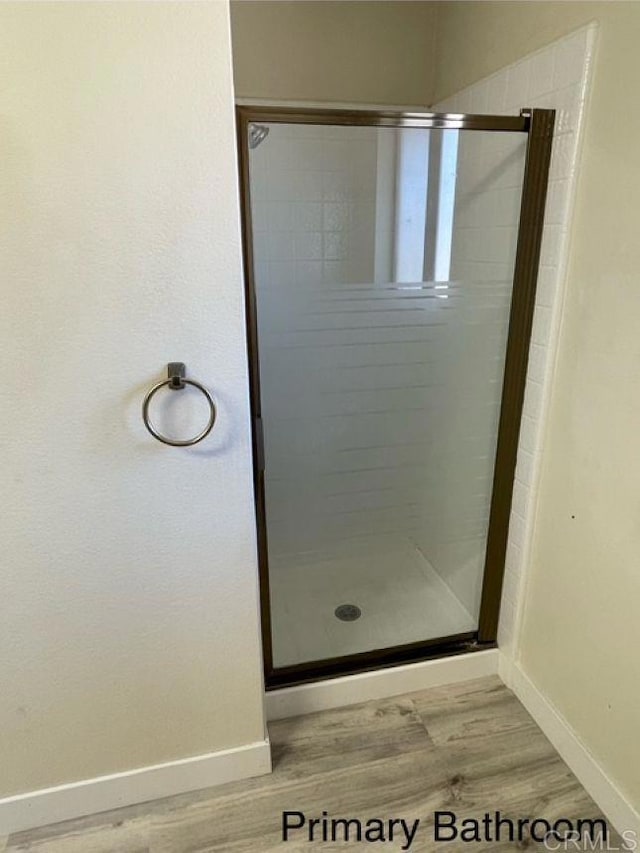 1003 Amherst Ave, Hemet, CA 92544 - full bathroom with wood finished floors and a stall shower