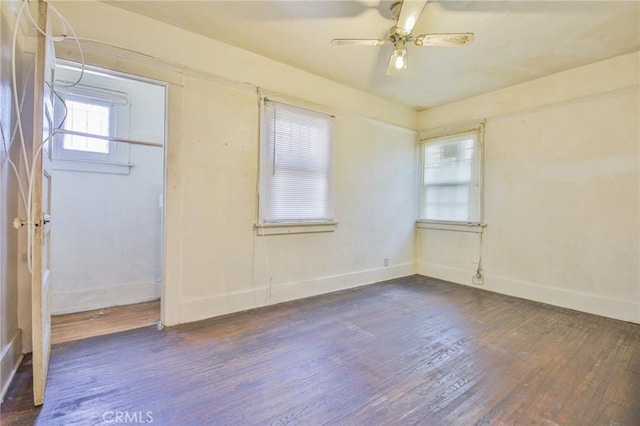 1615 W 39th Pl, Los Angeles, CA 90062 - empty room with dark wood-style floors and ceiling fan