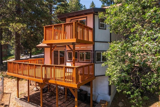 31303 Marcella Dr, Running Springs, CA 92382 - back of property featuring a balcony and a deck