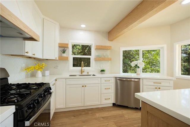 31303 Marcella Dr, Running Springs, CA 92382 - kitchen with stainless steel dishwasher, gas stove, premium range hood, open shelves, and recessed lighting