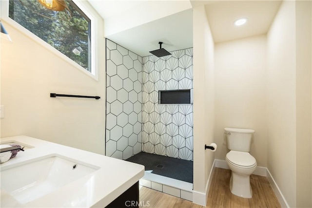 31303 Marcella Dr, Running Springs, CA 92382 - bathroom with wood finished floors, a tile shower, and double vanity