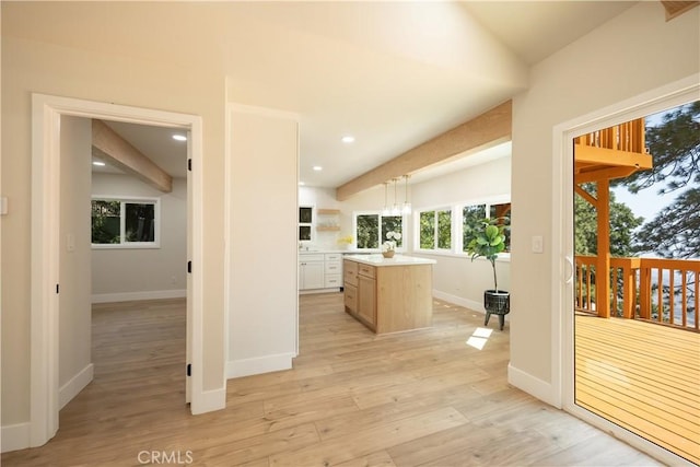 31303 Marcella Dr, Running Springs, CA 92382 - kitchen featuring light countertops, light wood-style floors, a center island, recessed lighting, and hanging light fixtures