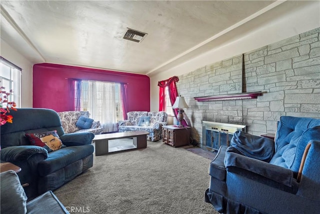 100 E Buena Vista St, Barstow, CA 92311 - carpeted living area featuring a fireplace