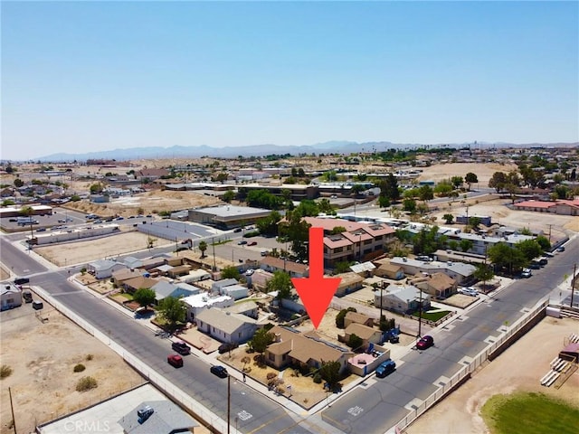 100 E Buena Vista St, Barstow, CA 92311 - aerial perspective of suburban area featuring a mountain backdrop